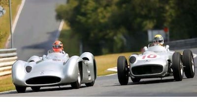 Michael Schumacher, left, and Nico Rosberg, his Mercedes-GP teammate, drive on the Nordschleife track yesterday. The track was dropped from the Formula One calendar in 1976 after Niki Lauda had an accident that resulted in the driver being badly burned.