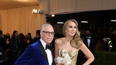 Fashion designer Tommy Hilfiger and wife Dee, who wore a gold lamé, strapless corset gown by Tommy Hilfiger. EPA