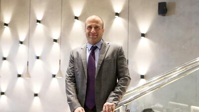 Osama Heikal, the chief executive of United Beverage and Food Company, got paid 4,000 Egyptian pounds per month for his first job. Pawan Singh / The National