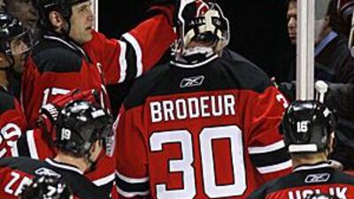The Devils' goaltender Martin Brodeur leaves the ice after his team's win over the Montreal Canadiens.