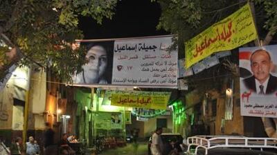Gameela Ismail’s campaign banner hangs among those for dozens of other candidates in Cairo.