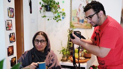 Ali Sufian, aka Lame Brown Dude, shoots a scene with his mother Farida, who almost always feature in his videos. Anna Nielsen for The National