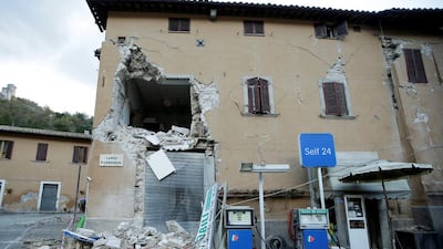 A collapsed building next to a petrol station in Visso, central Italy. Max Rossi/Reuters