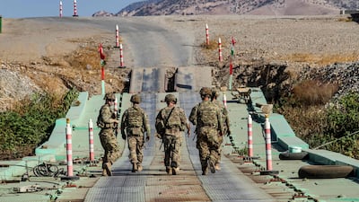 US soldiers patrol an area near Syria's northeastern Semalka border crossing with Iraq's Kurdish autonomous territory, on November 1, 2021. AFP