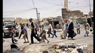 June 8, 2009: The same site, but without the shrine. In July 2014, the militants failed to destroy the 840-year old Crooked Minaret that leans like Italy’s Tower of Pisa when residents sat on the ground and linked arms to form a human chain. AP Photo