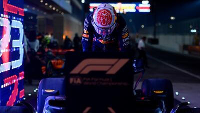 Red Bull driver Max Verstappen climbs out of his car following the sprint race at the Qatar GP in Lusail. Getty