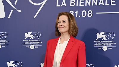 Sigourney Weaver is dressed in a Valentino suit with a cream blouse for a 'Master Gardner' photo call on September 3. Getty
