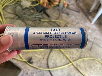 CS Smoke projectiles, made in the US, found in the gardens. Photo by Aline Khoury