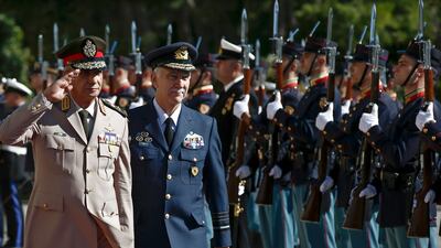 Egyptian Defence Minister Mohamed Zaki inspects the honour guard during a meeting with his Greek counterpart Panagiotopoulos in Athens, Greece. EPA