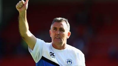 Wigan Athletic hired Owen Coyle to lead the club out of the Championship and his mission starts Sunday at Wembley Stadium. Matthew Lewis / Getty Images