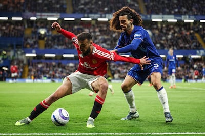 Manchester United's Moroccan defender Noussair Mazraoui, left, protects the ball from Chelsea's Marc Cucurella. AFP