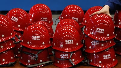 Hard hats at a production line of parts for CRH380B, a high speed train model of Tangshan Railway Vehicle. Kim Kyung-Hoon / Reuters