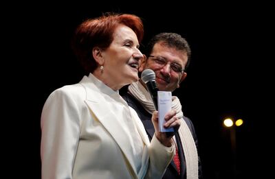 Istanbul Mayor Ekrem Imamoglu listens to IYI Party leader Meral Aksener during a rally in Istanbul last week. Reuters