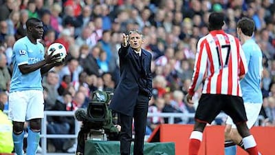 Roberto Mancini reacts from the touchline during Manchester City's Premier League loss to Sunderland on Sunday.
