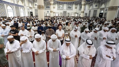 Muslims take part in Eid Al Adha prayers at Al Farooq Omar Bin Al Khattab Mosque in Al Safa, Dubai. Antonie Robertson / The National