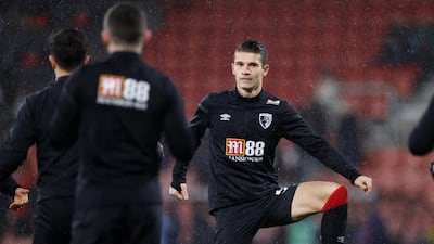 Bournemouth signed winger Alex Dobre on loan from Wigan Athletic. Reuters