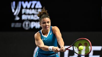 Jasmine Paolini returns the ball to Elena Rybakina. EPA