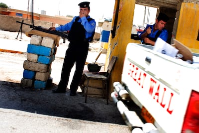 Kurds Military force at a checkpoint in Mosul. Photo by Getty Images