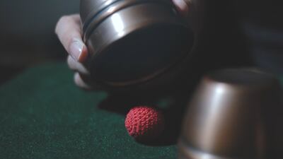Buy magic trick essentials, such as these cups and balls, at the shop.