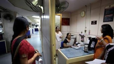 Indian women in an office in New Delhi. The 2 billion women living in Asia are still paid less than men for similar work and are under-represented in top leadership positions.