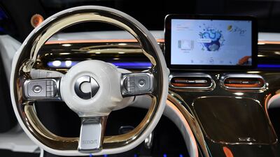 The steering wheel and display screen in the new Smart Concept #1 car. Reuters
