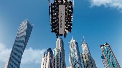 Guests being lifted up for the Dinner in the Sky in Dubai. Courtesy DMN