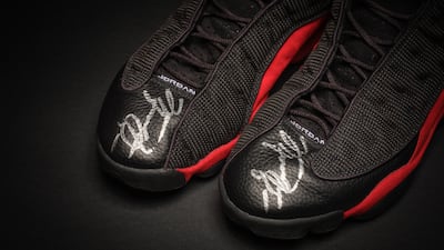Basketball star Michael Jordan's trainers have sold at auction for more than $2.2 million. PA