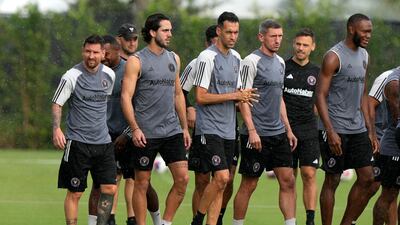 Inter Miami forward Lionel Messi, left, forward Leonardo Campana, second from left, and midfielder Sergio Busquets, third from left, do drills during practice. AP Photo