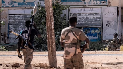 Sudanese army soldiers patrol an area in Khartoum North. AFP