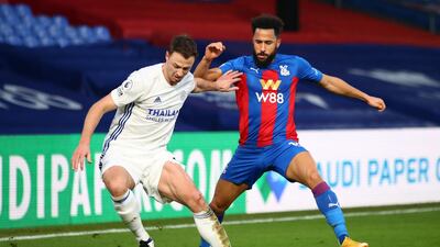 Leicester City's Jonny Evans and Crystal Palace's Andros Townsend, right, battle for the ball. PA
