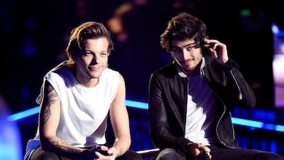 Singers Louis Tomlinson and Zayn Malik of One Direction. Getty Images
