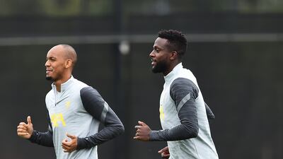Liverpool's Fabinho, left, with Divock Origi. Getty