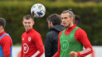 Wales' Gareth Bale (right) during the training session at the Vale Resort. PA