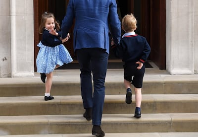 Prince William, Duke of Cambridge, and his children Prince George and Princess Charlotte arrive to visit his wife, Catherine, Duchess of Cambridge and newborn Prince Louis. Andy Rain/ EPA