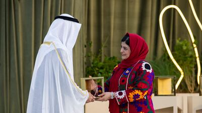 President Sheikh Mohamed presents the Zayed Award For Human Fraternity to Zarqa Yaftali, an advocate for Afghan girls’ education