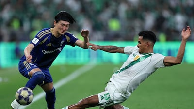 Hotaka Nakamura of Machida Zelvia is challenged by Galeno of Al Ahli. Getty Images