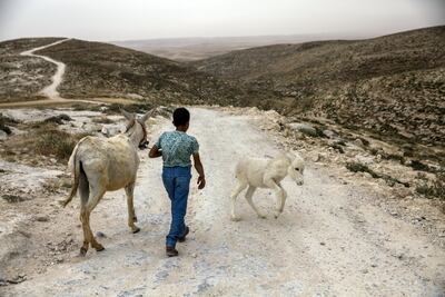 Roads leading to some West Bank villages are too rough for water lorries to travel. Heidi Levine for The National