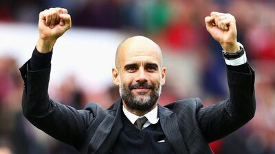 Manchester City manager Pep Guardiola celebrates his side’s win in the Premier League on Saturday, August 20, 2016. Michael Steele / Getty Images