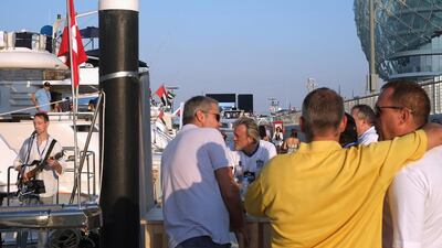 Stefan Malinowski sings on the Traumtanzer yacht at Yas Marina on November 21, during the Abu Dhabi Grand Prix weekend. Delores Johnson / The National