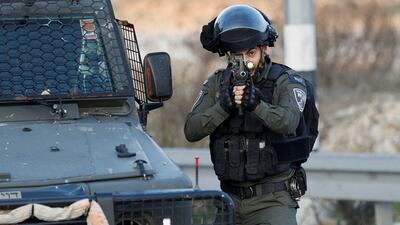 A member of the Israeli forces during a clash with Palestinians at Beit El, near Ramallah, in the Israeli-occupied West Bank on December 8. Reuters