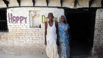 Indian farmer Ramjanam Mauriya, left, has been struggling to prove to authorities that he is still alive after being declared dead by his younger brother, who likely bribed corrupt officials to grab his land. Sanjay Kanojia/AFP Photo
