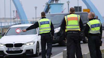 German police check vehicles arriving from Poland at a temporary border checkpoint in Frankfurt. Getty Images