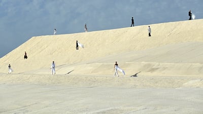 Models take to the catwalk at the 'Le Papier' Jacquemus fashion show in Arles, France. Getty Images