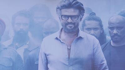 Fans pour milk on a huge poster of superstar Rajinikanth in Chennai, India. AP