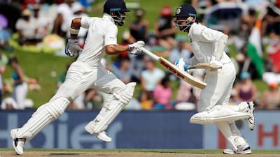 The likes of Murali Vijay, right, have been unable to emulate Virat Kohli. Themba Hadebe / AP Photo