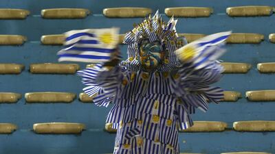 A fan of Uruguay waits for the start of the Russia 2018 FIFA World Cup football qualifier match between Uruguay and Paraguay in Montevideo. AFP