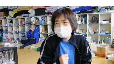 Sachie Tominaga is living in the at the Minato Elementary School with her husband and teenage son. Their house in uninhabitable.