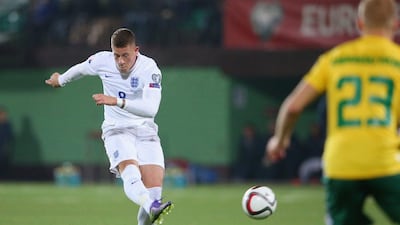 Ross Barkley of England shoots and scores their first goal in Monday night’s Euro 2016 qualifying win over Lithuania in Vilnius. Alex Livesey / Getty Images
