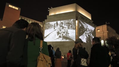 The external walls of the Holocaust Memorial Museum, where photos of Myanmar’s Rohingya Muslims are being projected. Alex Brandon / AP