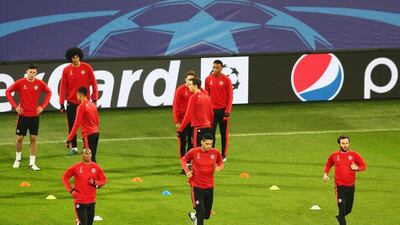 Ashley Young, Michael Carrick and Juan Mata warm up during Manchester United’s training session in Wolfsburg on Monday. Martin Rose / Bongarts / Getty Images